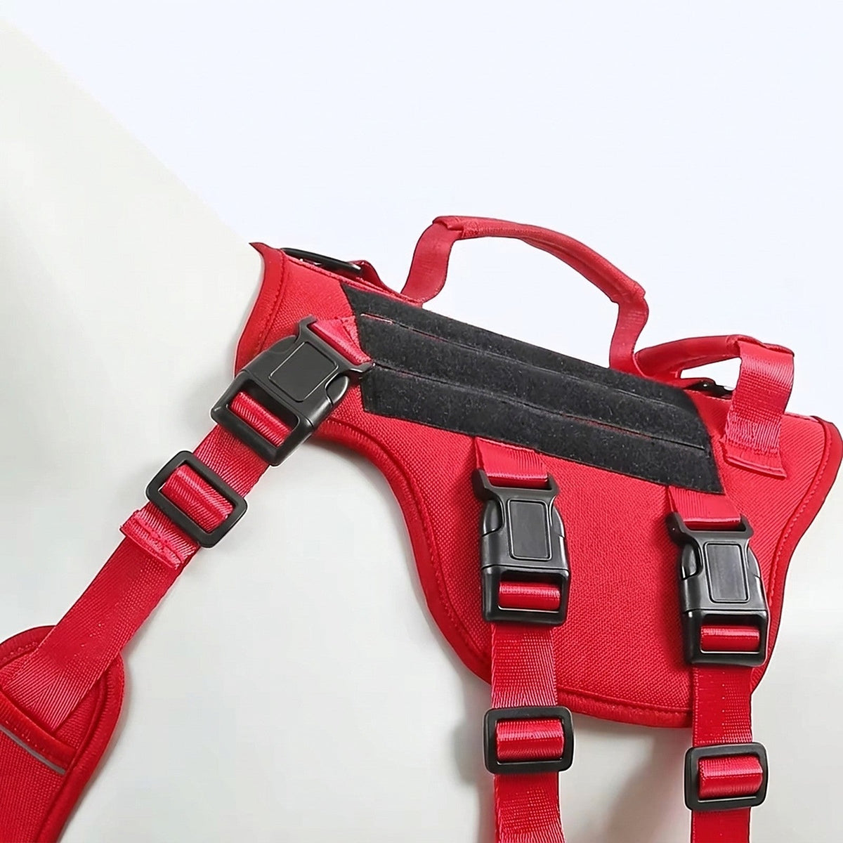 Adjustable chest and belly straps with quick-release buckles on the Hauloft tactical harness