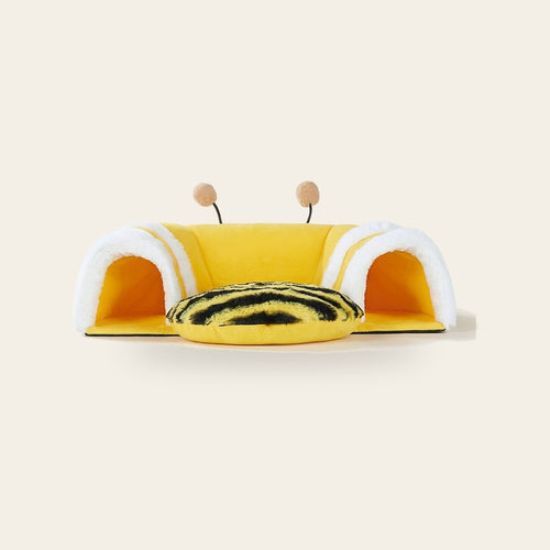 Bee Hideout Tunnel for rabbits and guinea pigs on a plain sand background