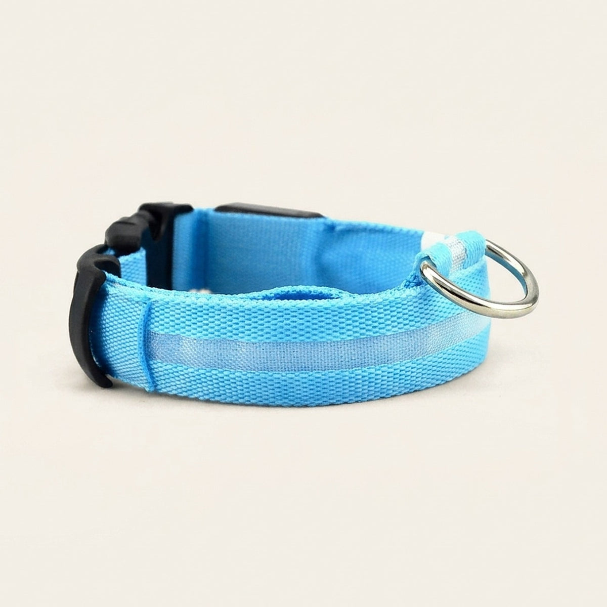 Hauloft LED light-up dog collar in blue, light off, on a plain background