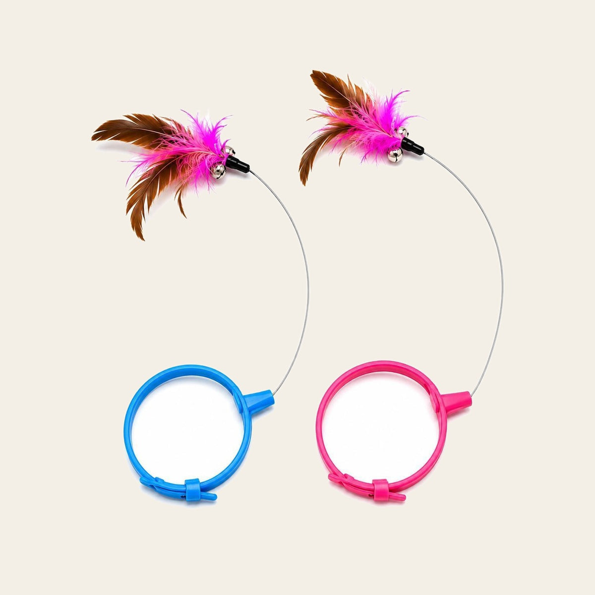 Feather Collar Cat Teaser in blue and pink on a plain sand background