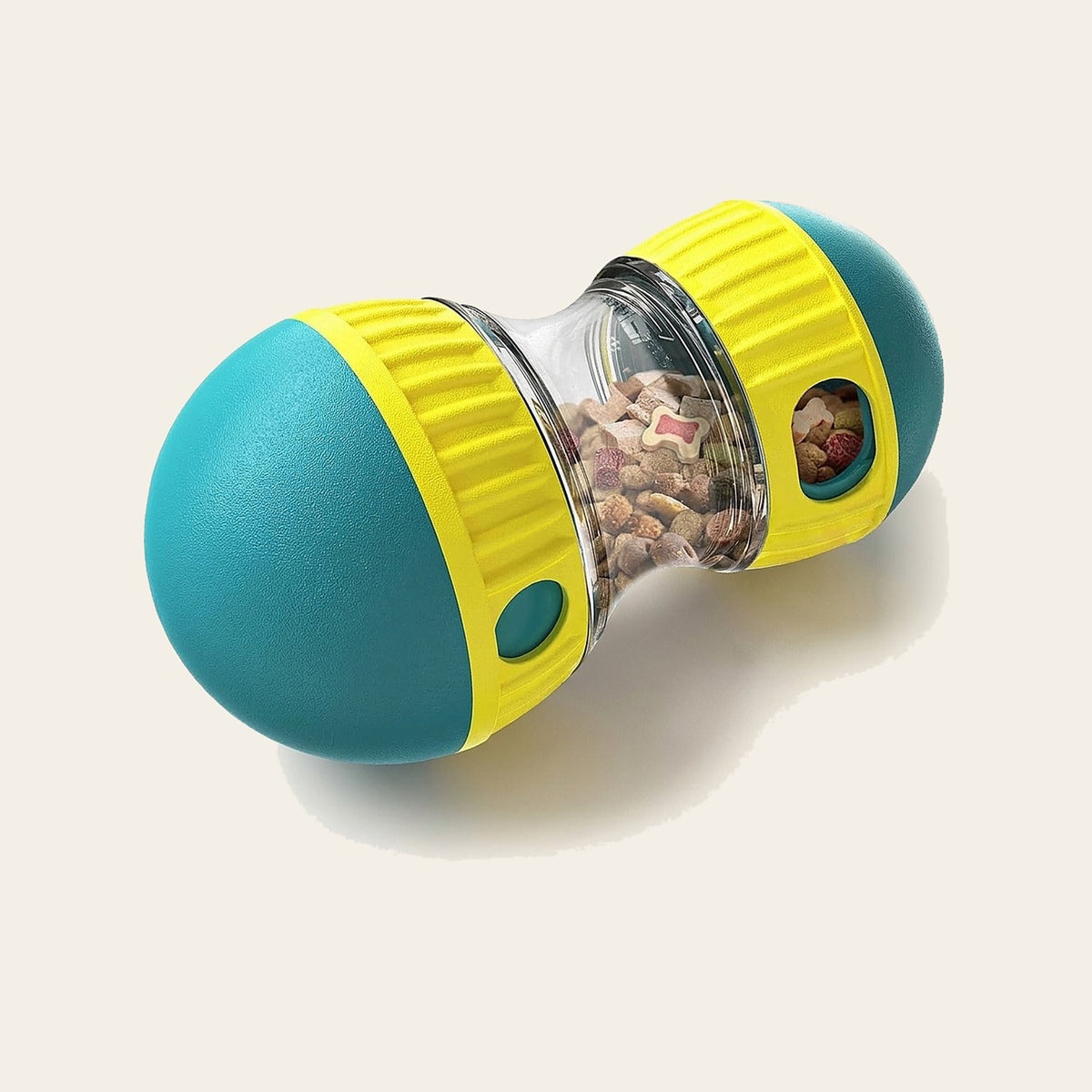 Treat Puzzle Ball for Dogs in teal and yellow on a plain sand background